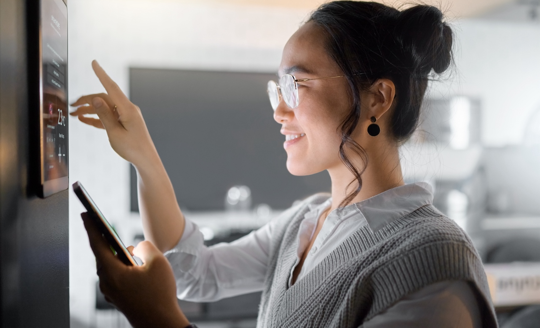 woman using smart home technology